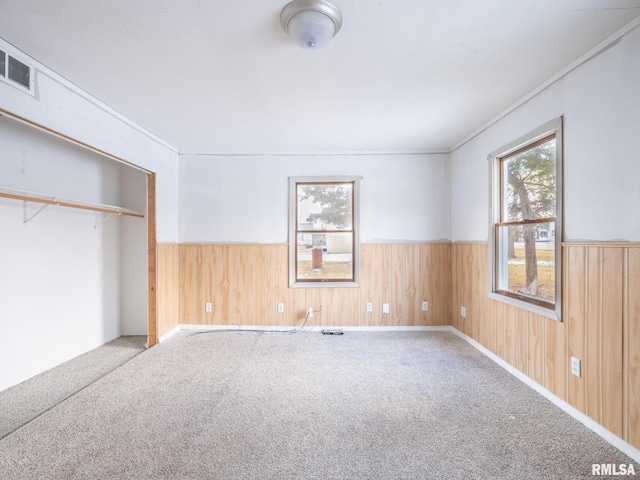 unfurnished bedroom featuring a closet and carpet flooring