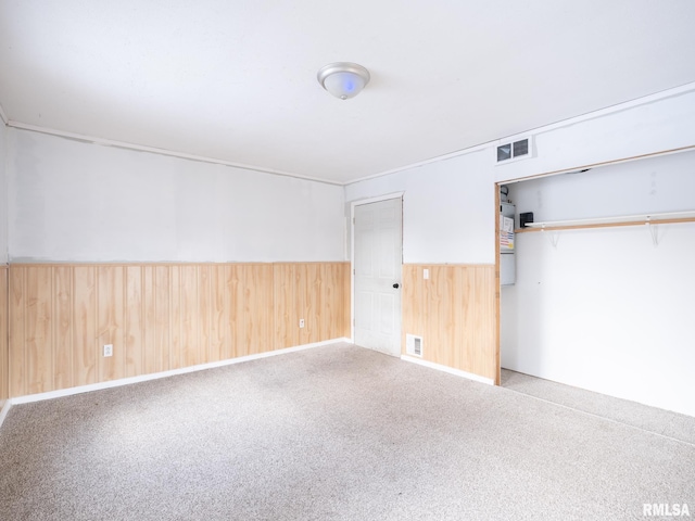 interior space featuring wooden walls