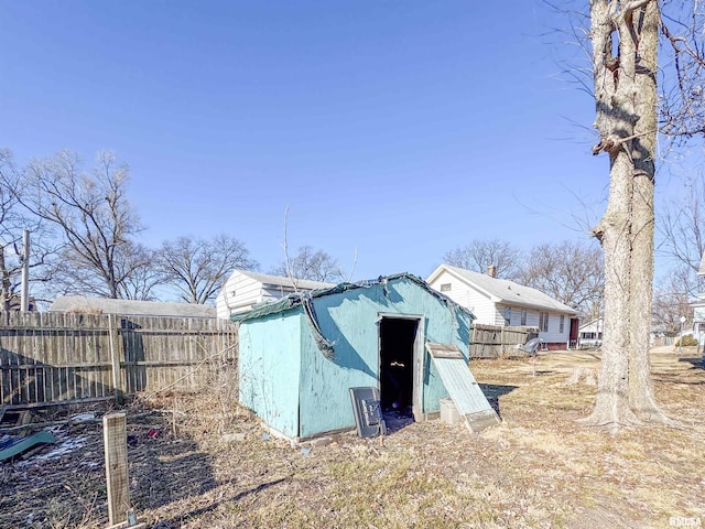 view of storm shelter featuring a storage shed