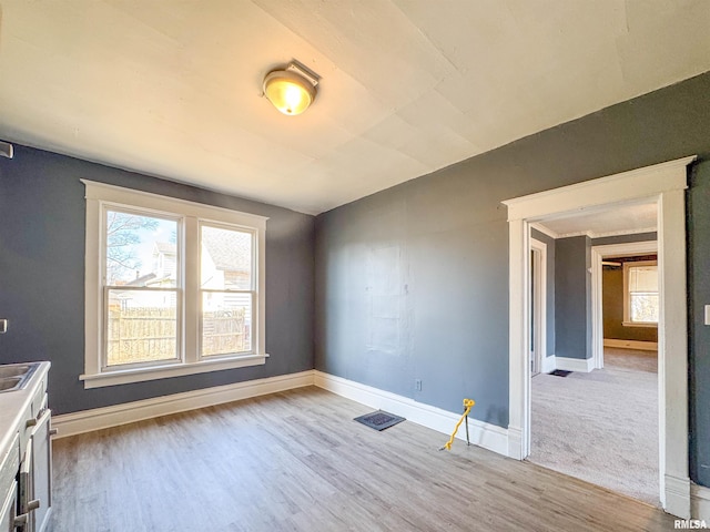 interior space featuring plenty of natural light and light wood-type flooring