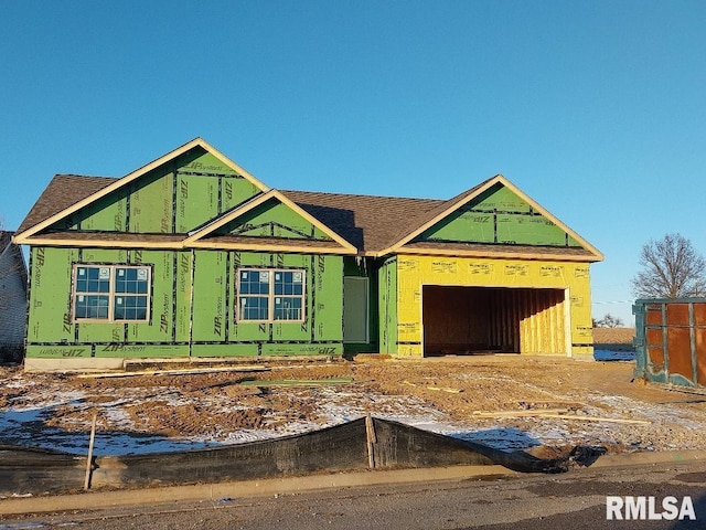 property in mid-construction with a garage