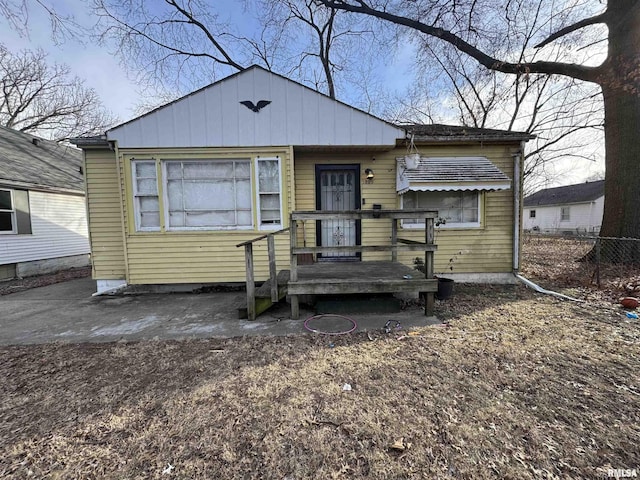 view of front of property with a wooden deck