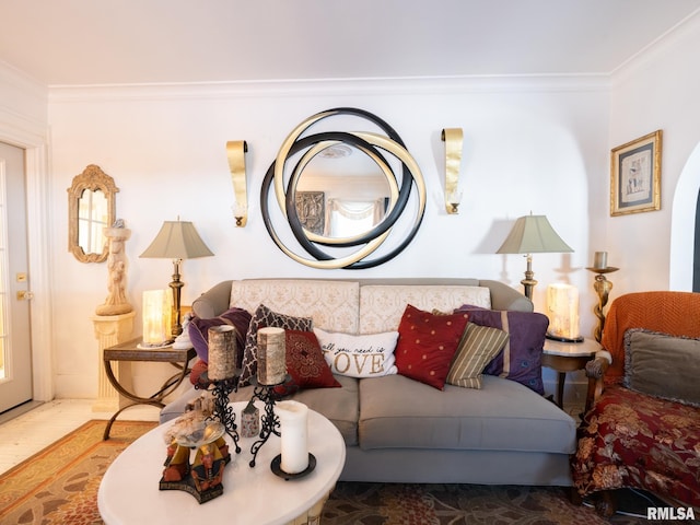 living room with wood-type flooring and crown molding