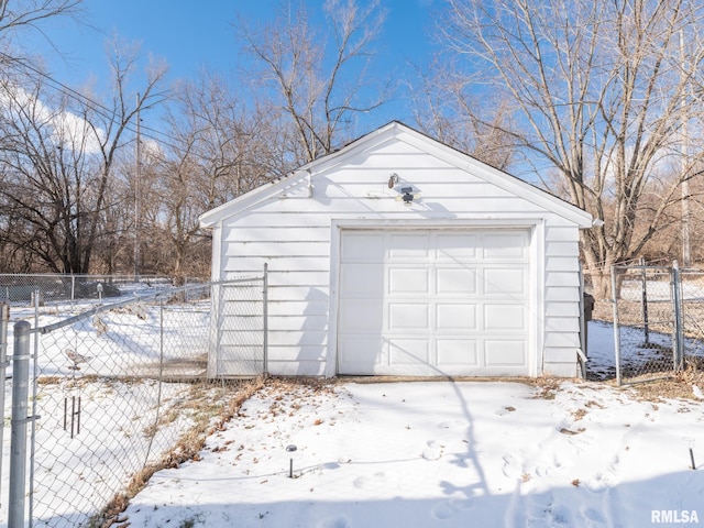 view of snow covered garage