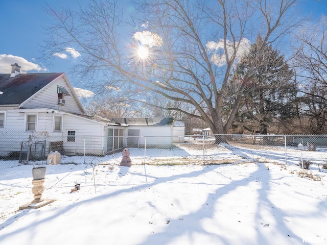 view of yard covered in snow