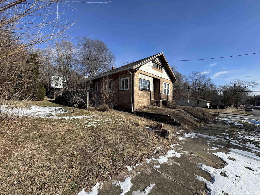 view of snow covered property