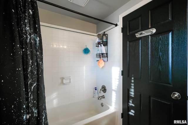 bathroom with shower / tub combo