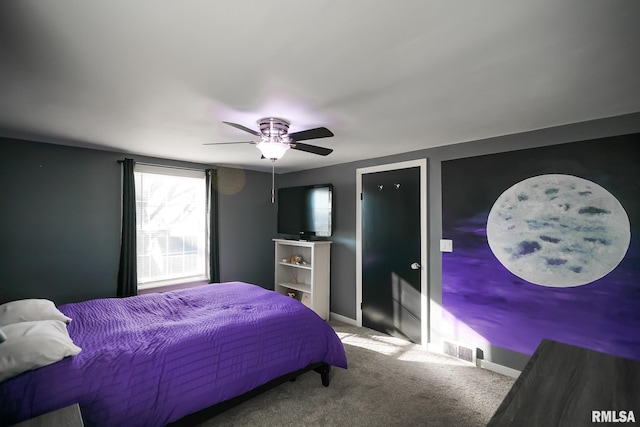 bedroom featuring ceiling fan and carpet floors