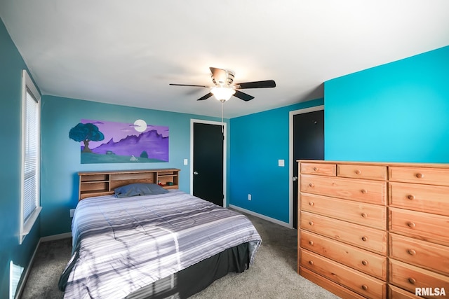 bedroom with ceiling fan and carpet