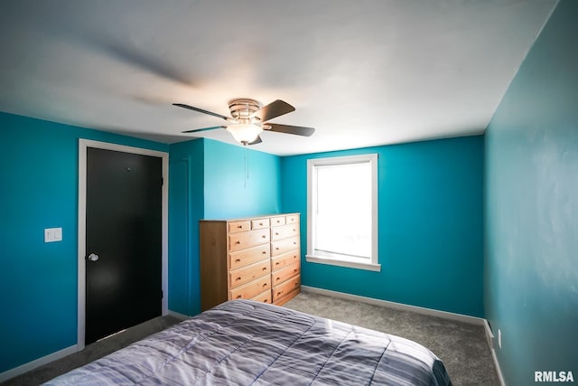 bedroom with ceiling fan and carpet