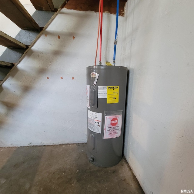 utility room with electric water heater