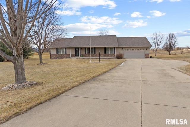 ranch-style home with a front yard and a garage