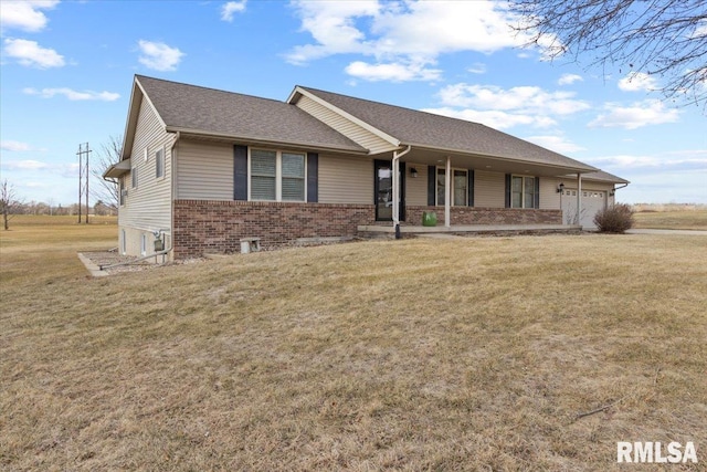 ranch-style home featuring a garage and a front yard