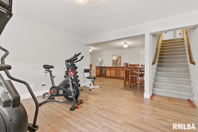 exercise area featuring light hardwood / wood-style flooring