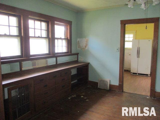 interior space featuring ornamental molding