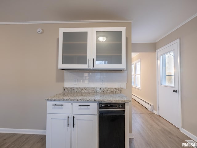 kitchen featuring white cabinetry, a baseboard heating unit, tasteful backsplash, light hardwood / wood-style floors, and light stone counters