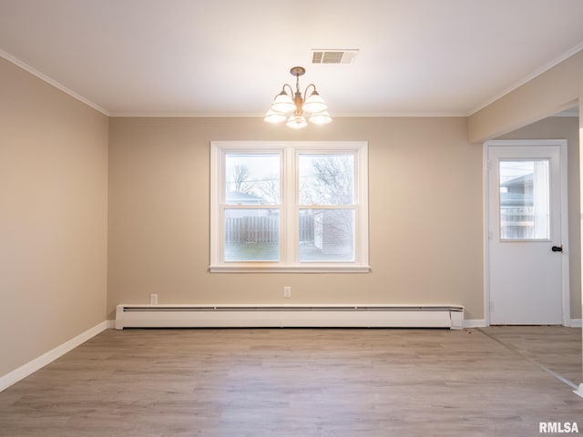 unfurnished dining area with light hardwood / wood-style floors, baseboard heating, crown molding, and an inviting chandelier