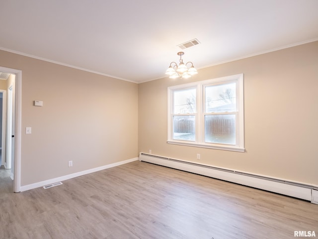 spare room with baseboard heating, ornamental molding, light hardwood / wood-style floors, and an inviting chandelier