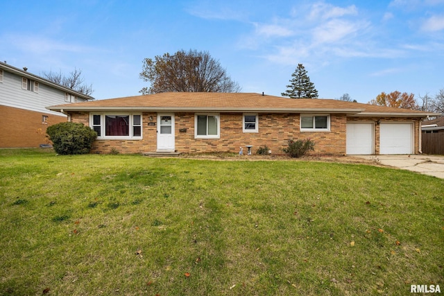 ranch-style home featuring a garage and a front lawn