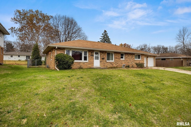 single story home with a front lawn and a garage