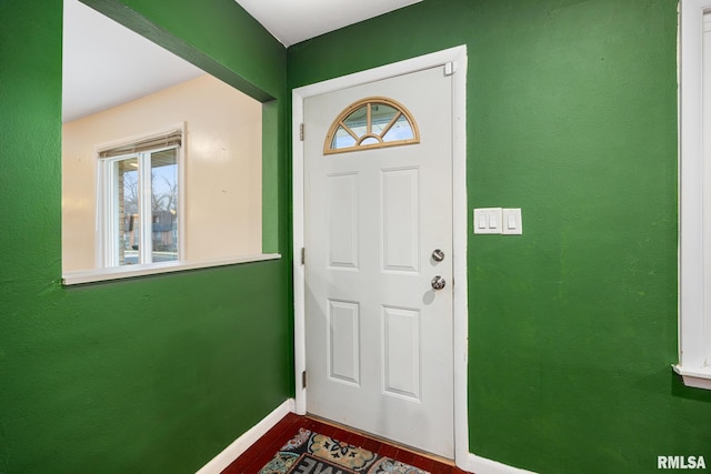 foyer entrance with hardwood / wood-style floors