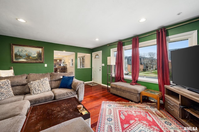 living room with dark wood-type flooring