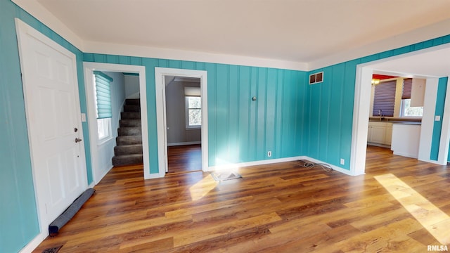 interior space with sink and hardwood / wood-style floors