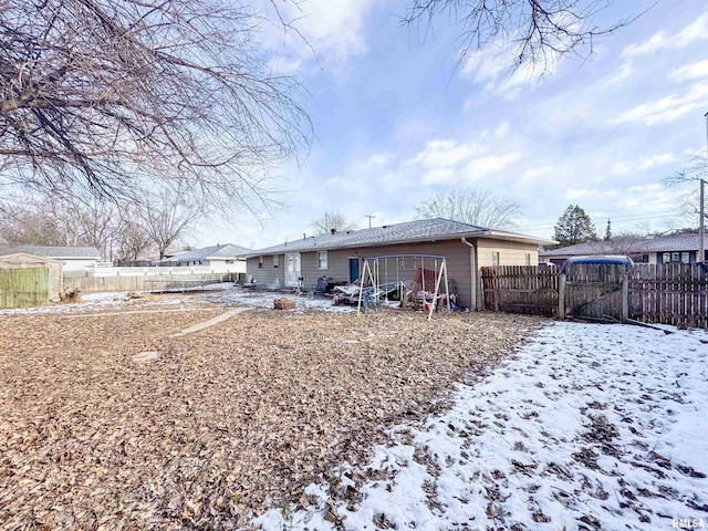 view of snow covered property