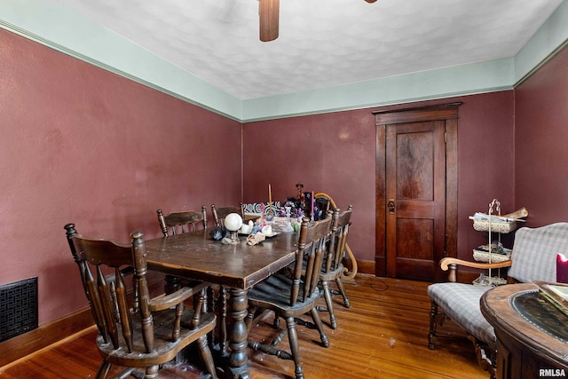 bedroom with electric panel and dark colored carpet