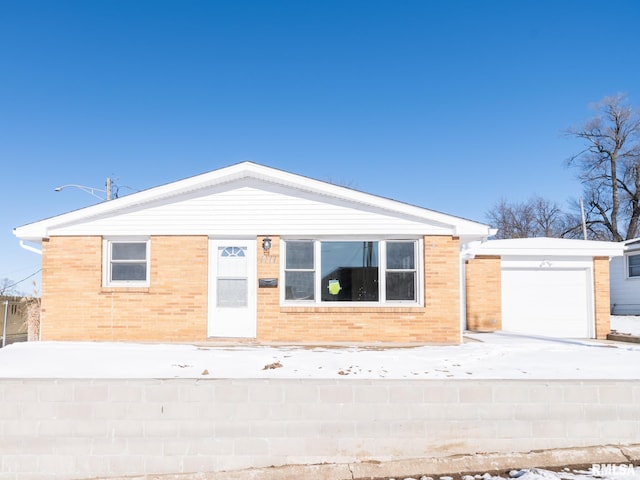 single story home with a garage