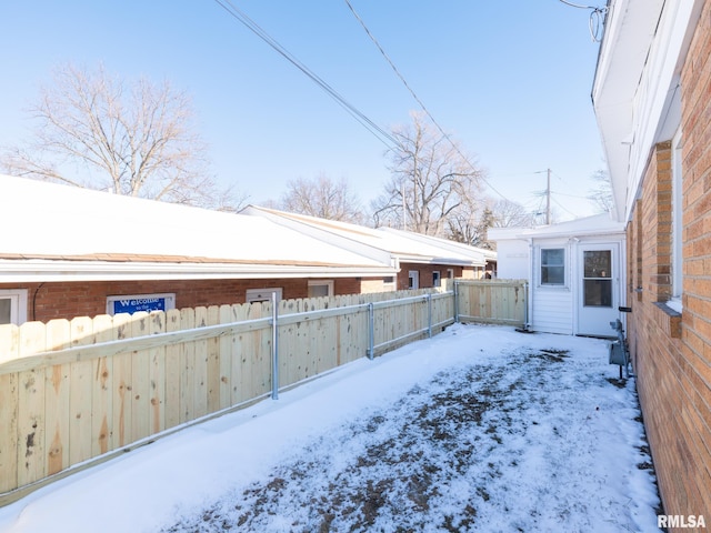 view of yard covered in snow