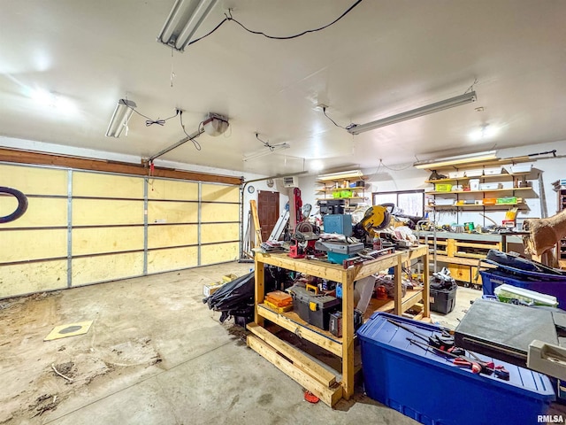 garage with a workshop area