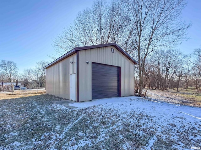 view of snow covered garage