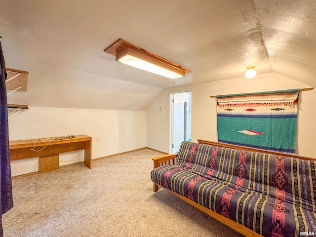 living room featuring carpet floors, a textured ceiling, and vaulted ceiling