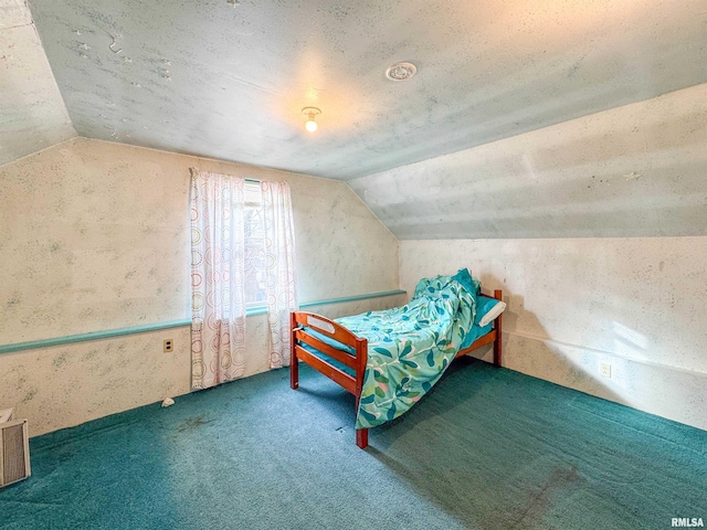 unfurnished bedroom featuring vaulted ceiling and carpet