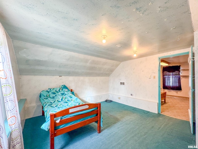 sitting room featuring vaulted ceiling and carpet