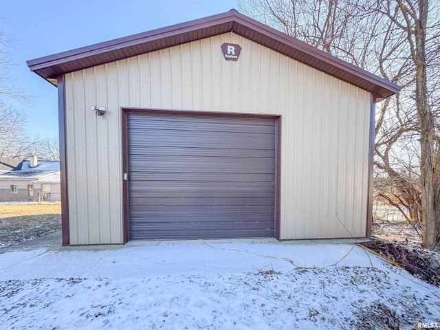 view of snow covered garage