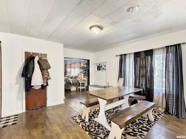 hallway with light hardwood / wood-style floors