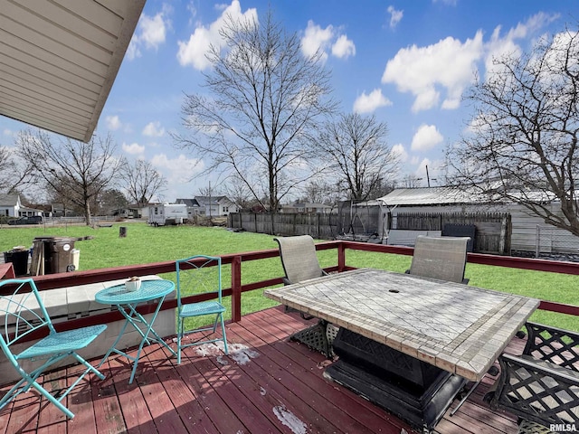 wooden deck with a yard