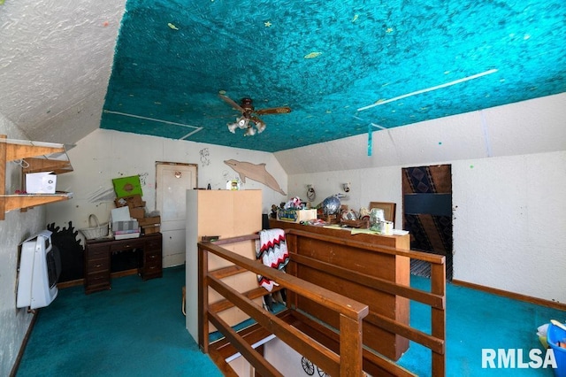 bedroom with a textured ceiling and lofted ceiling