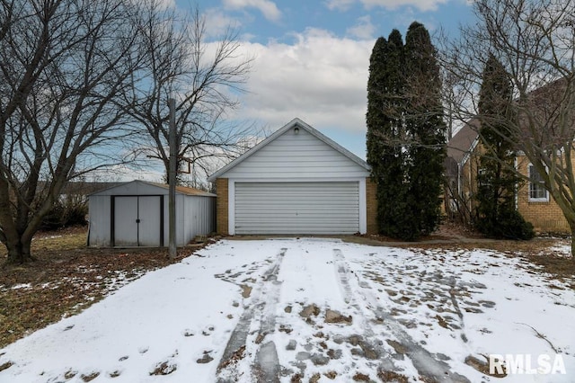 view of snow covered garage