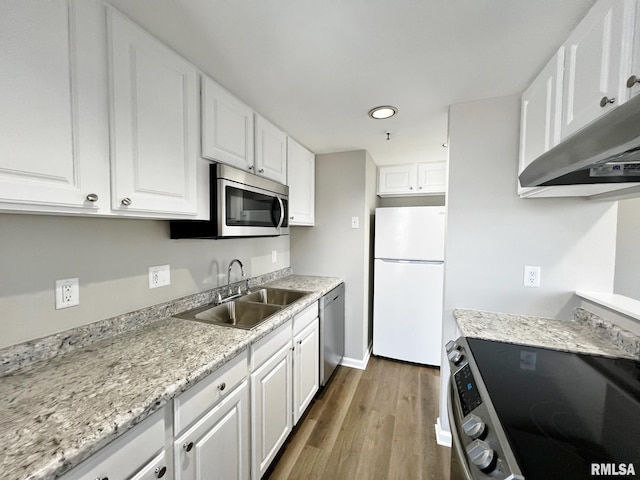 kitchen featuring sink, white cabinetry, and stainless steel appliances