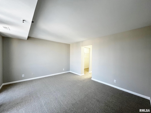 spare room with carpet floors