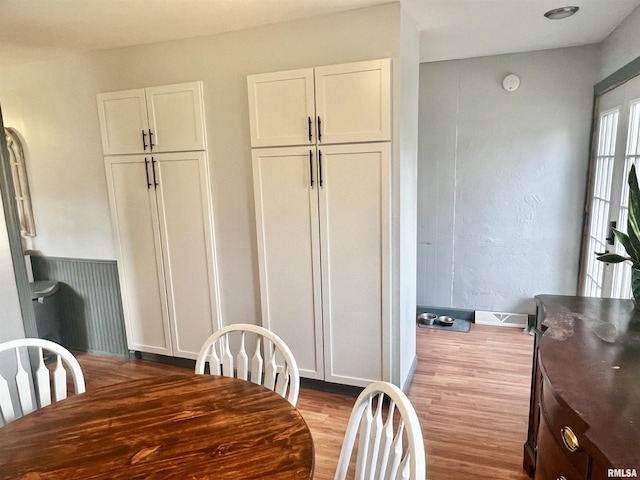 dining room featuring light hardwood / wood-style floors