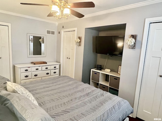 bedroom with ceiling fan and crown molding