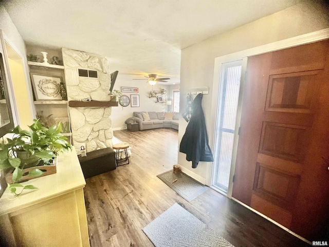 entryway featuring ceiling fan and wood-type flooring