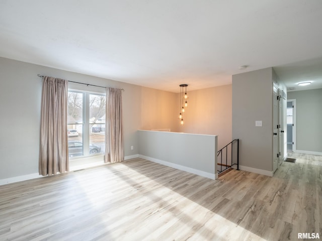 empty room featuring light hardwood / wood-style floors