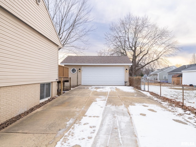 view of snow covered garage