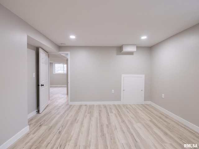 unfurnished room featuring light hardwood / wood-style floors