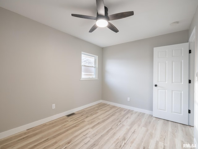 unfurnished room with light hardwood / wood-style flooring and ceiling fan